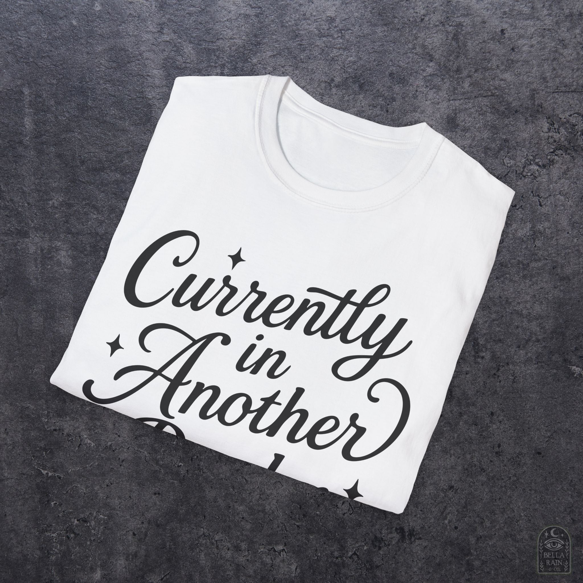 Currently In Another Realm Unisex Softstyle T-Shirt