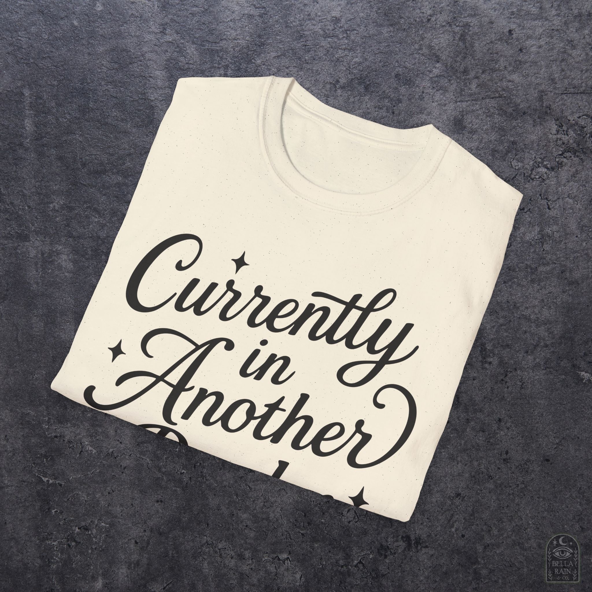 Currently In Another Realm Unisex Softstyle T-Shirt