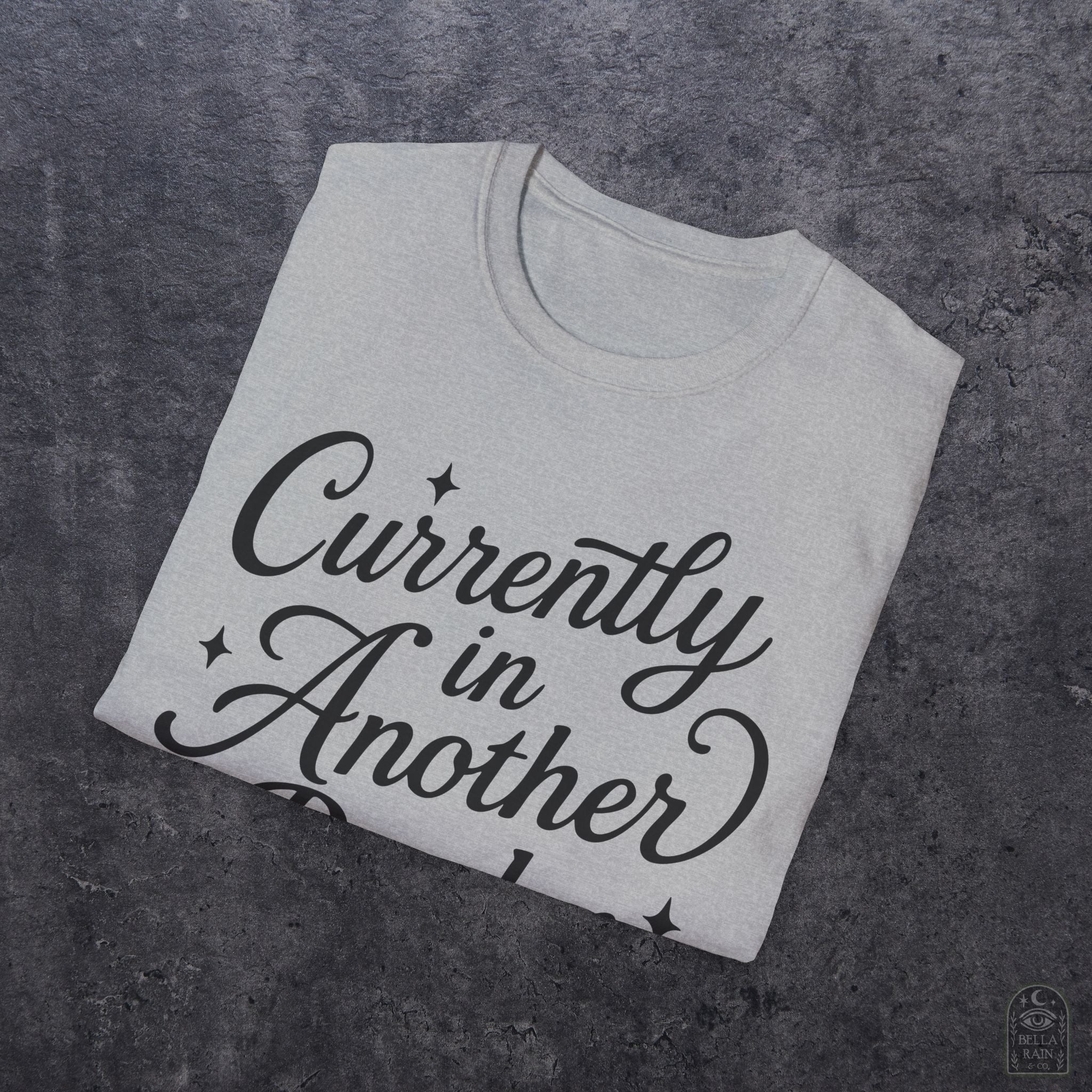 Currently In Another Realm Unisex Softstyle T-Shirt